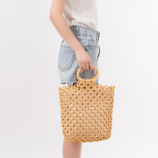 Handbag hand-woven bag women's summer niche design hollow commuting wooden beads women's bag