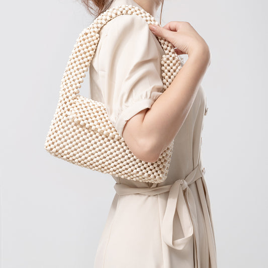 Women's underarm bag niche design handmade wooden bead woven bag high-end commuter bag