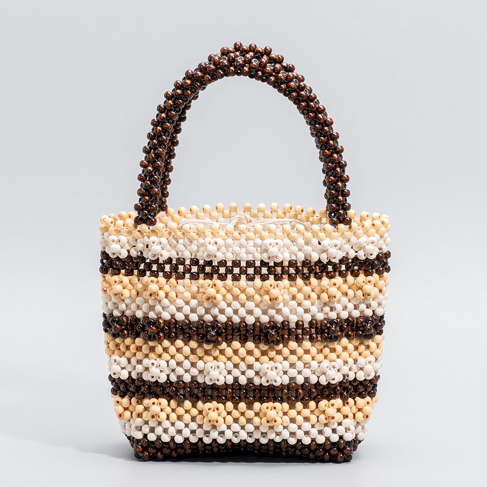 Hand-held wooden bead bag, seaside beach vacation bag, ladies' high-end exquisite hand-woven bag