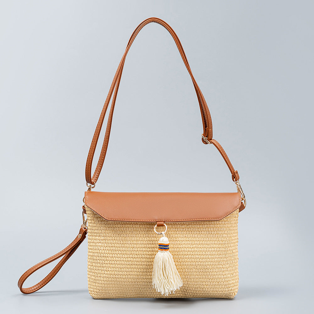 Beach straw bag tassel woven bag women's high-end exquisite shoulder bag seaside holiday clutch bag