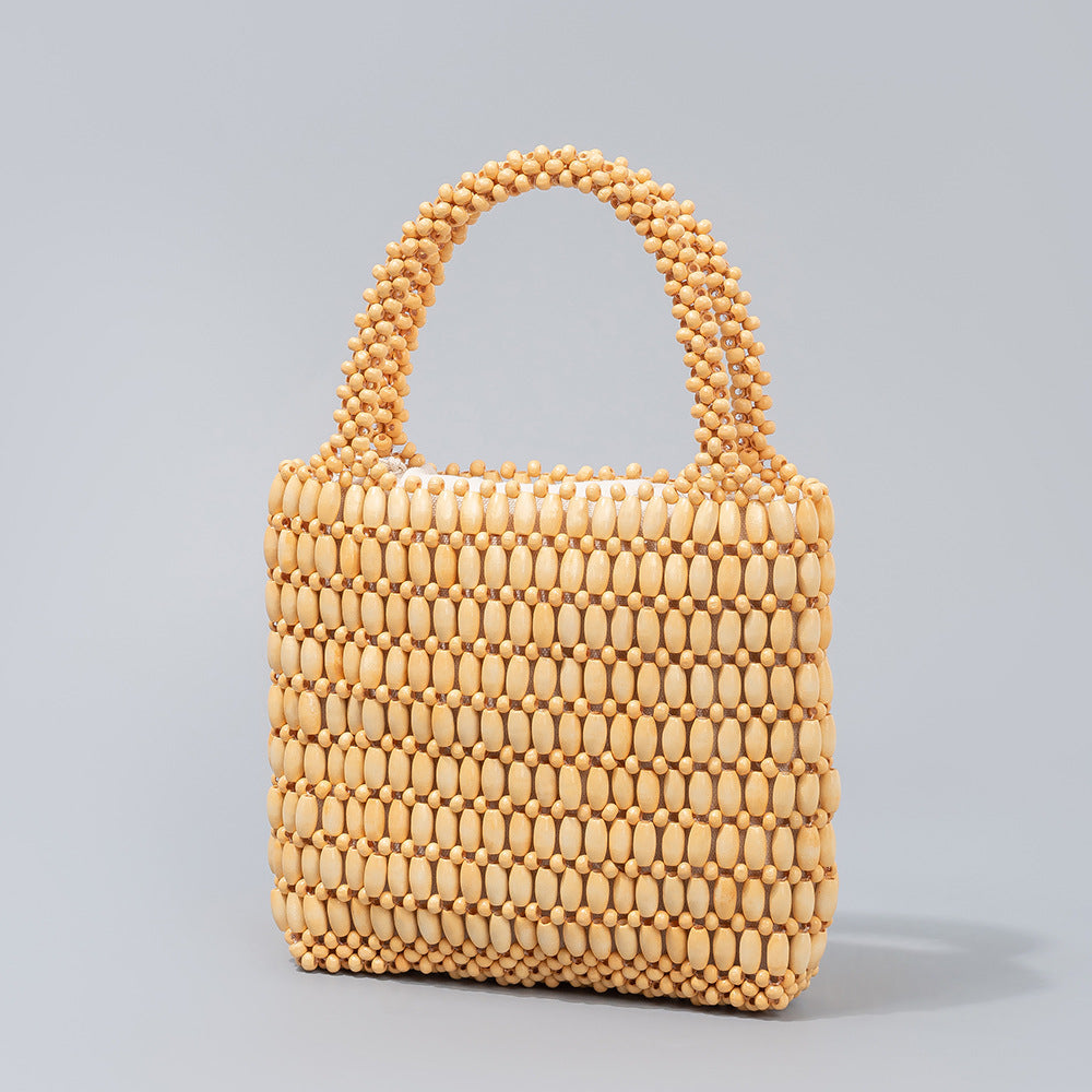 Fashion wooden bead bag hand-woven bag female niche design hand-held commuter bag high-end female bag