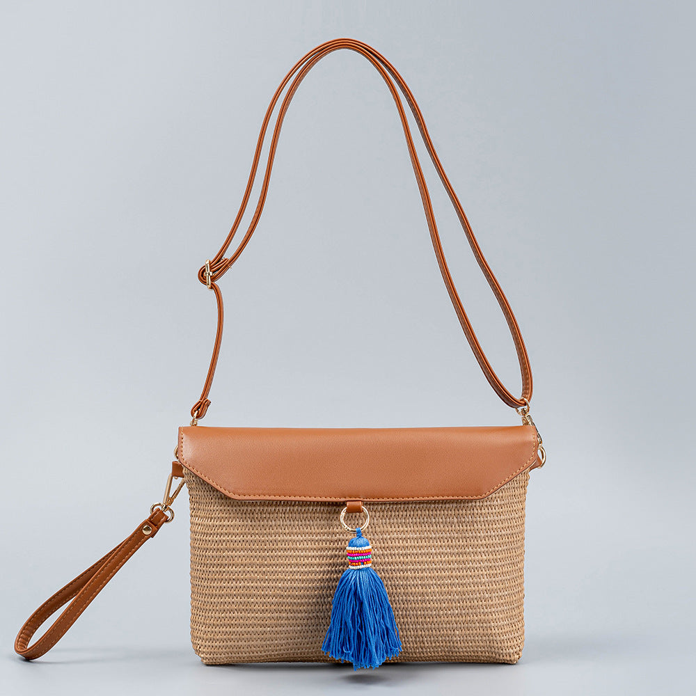 Beach straw bag tassel woven bag women's high-end exquisite shoulder bag seaside holiday clutch bag