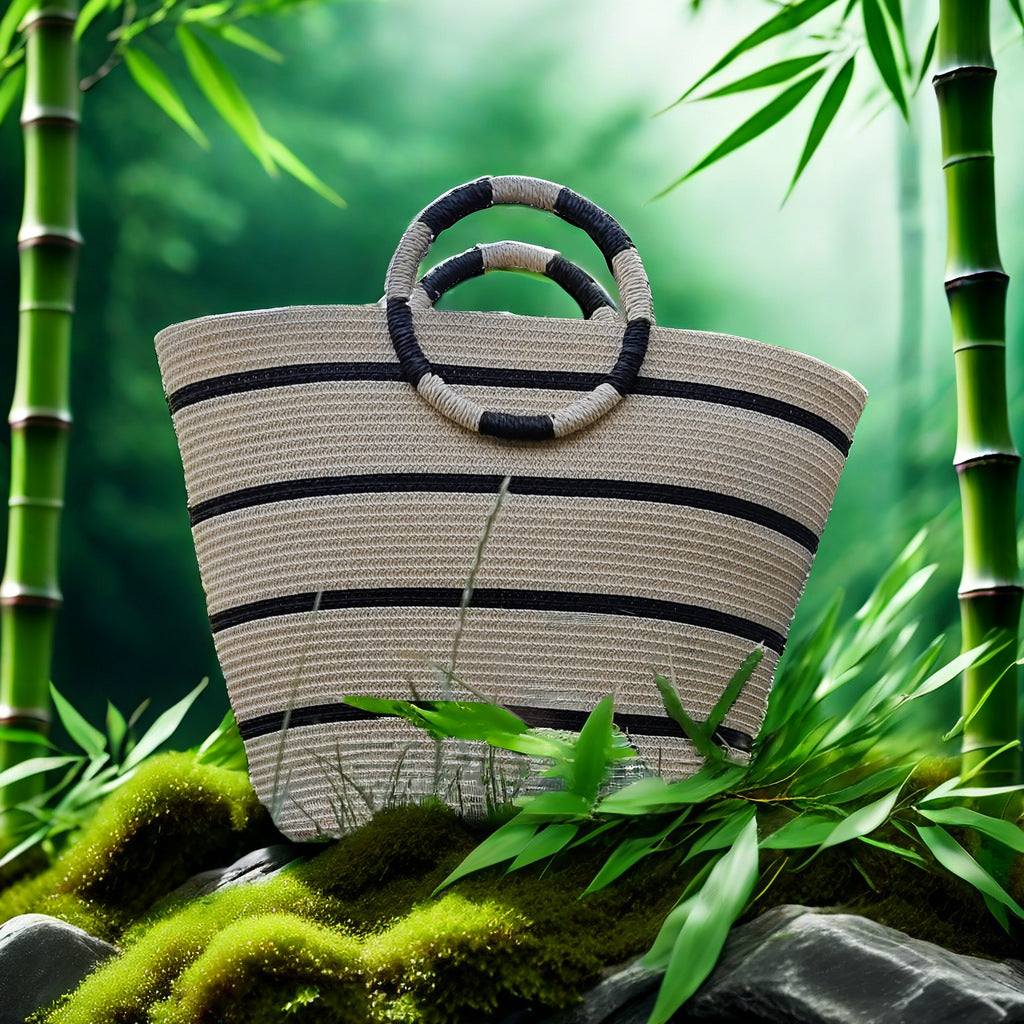 Simple retro woven straw hand-held bucket tote bag female ring bag fashionable commuting versatile sand