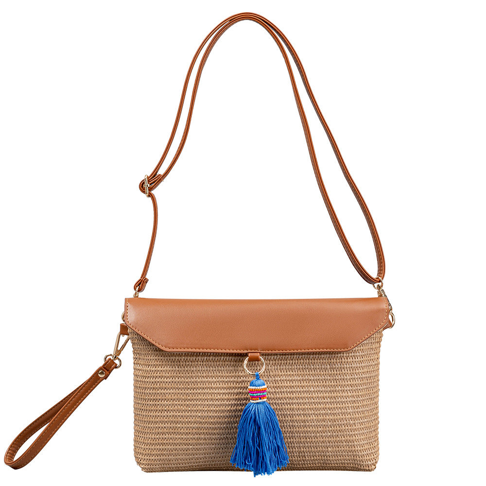 Beach straw bag tassel woven bag women's high-end exquisite shoulder bag seaside holiday clutch bag