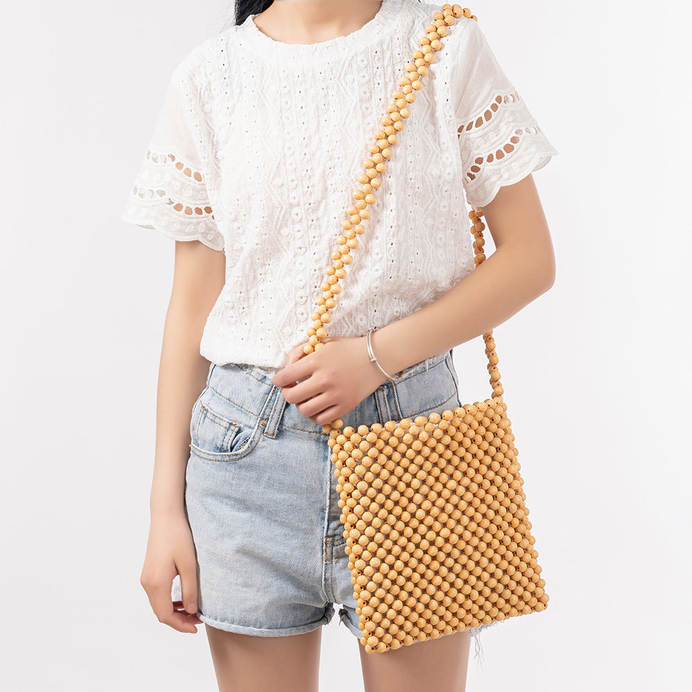 Crossbody shoulder bag women's summer niche design wooden bead bag commuting handmade woven bag female