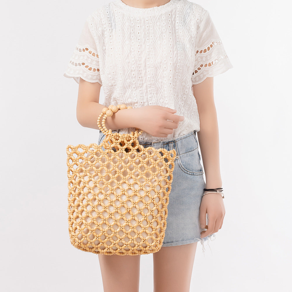 Handbag hand-woven bag women's summer niche design hollow commuting wooden beads women's bag