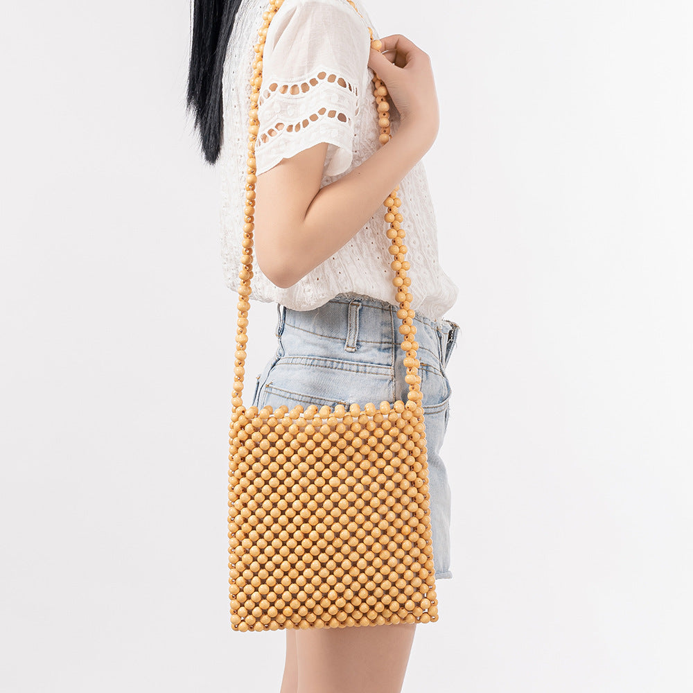 Crossbody shoulder bag women's summer niche design wooden bead bag commuting handmade woven bag female